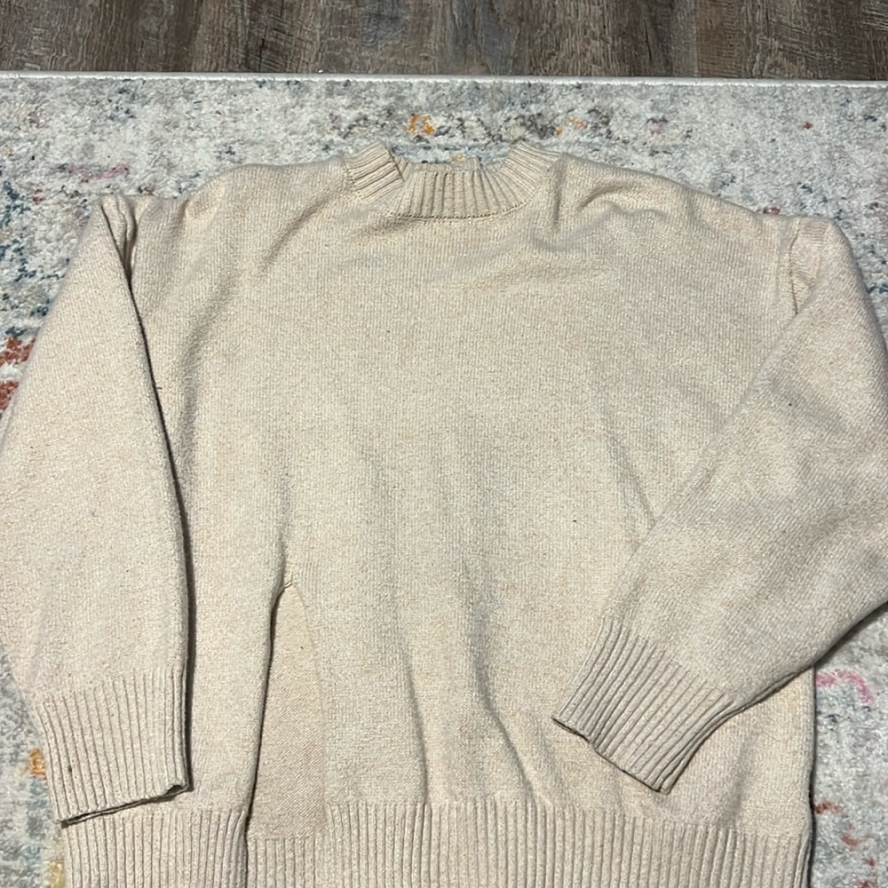 Tan sweater with slit